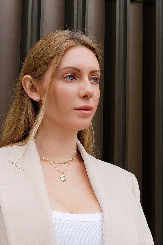 Shine Bright with the Starburst-Oval Necklace from Jacys Mifv