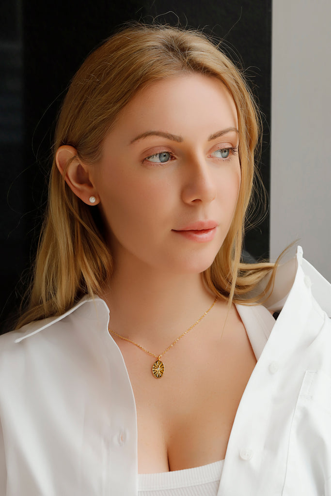 Elevate Your Style with the Starburst-Oval Necklace: A Must-Have Jewelry Piece